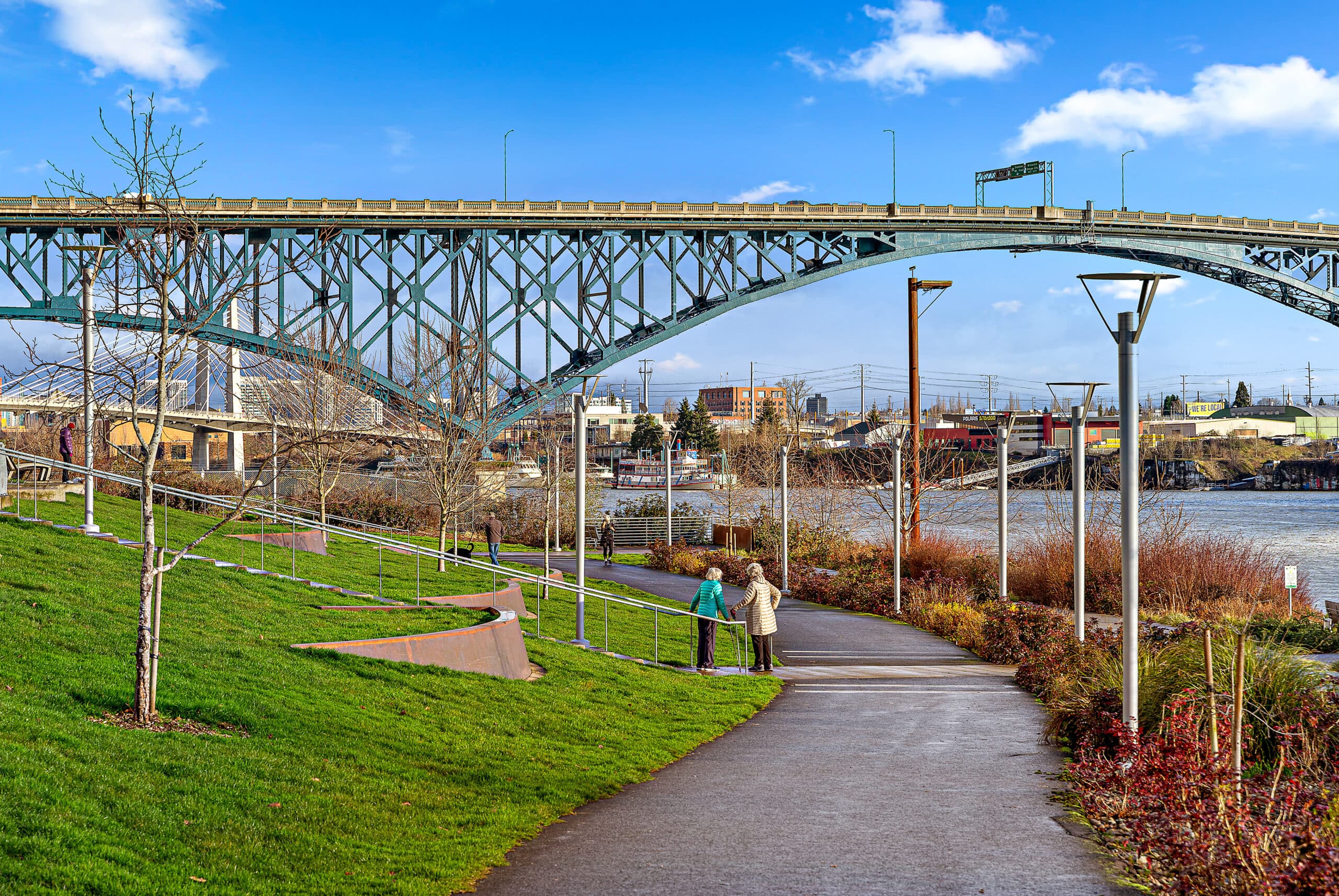 A bike path at Mirabella Portland next to the Willamette river.